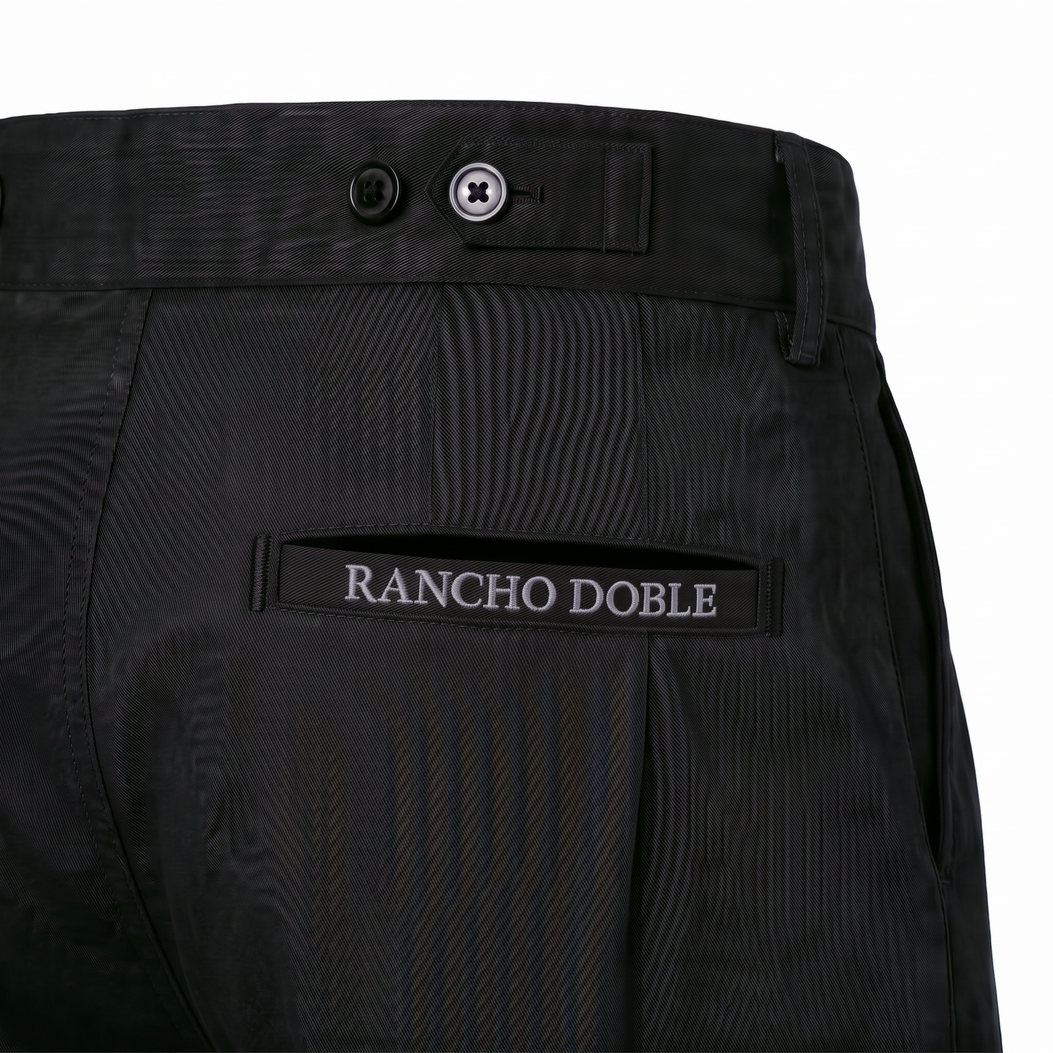 Bombacha de Campo Rancho Doble Negro — detalle bolsillo trasero con etiqueta tejida