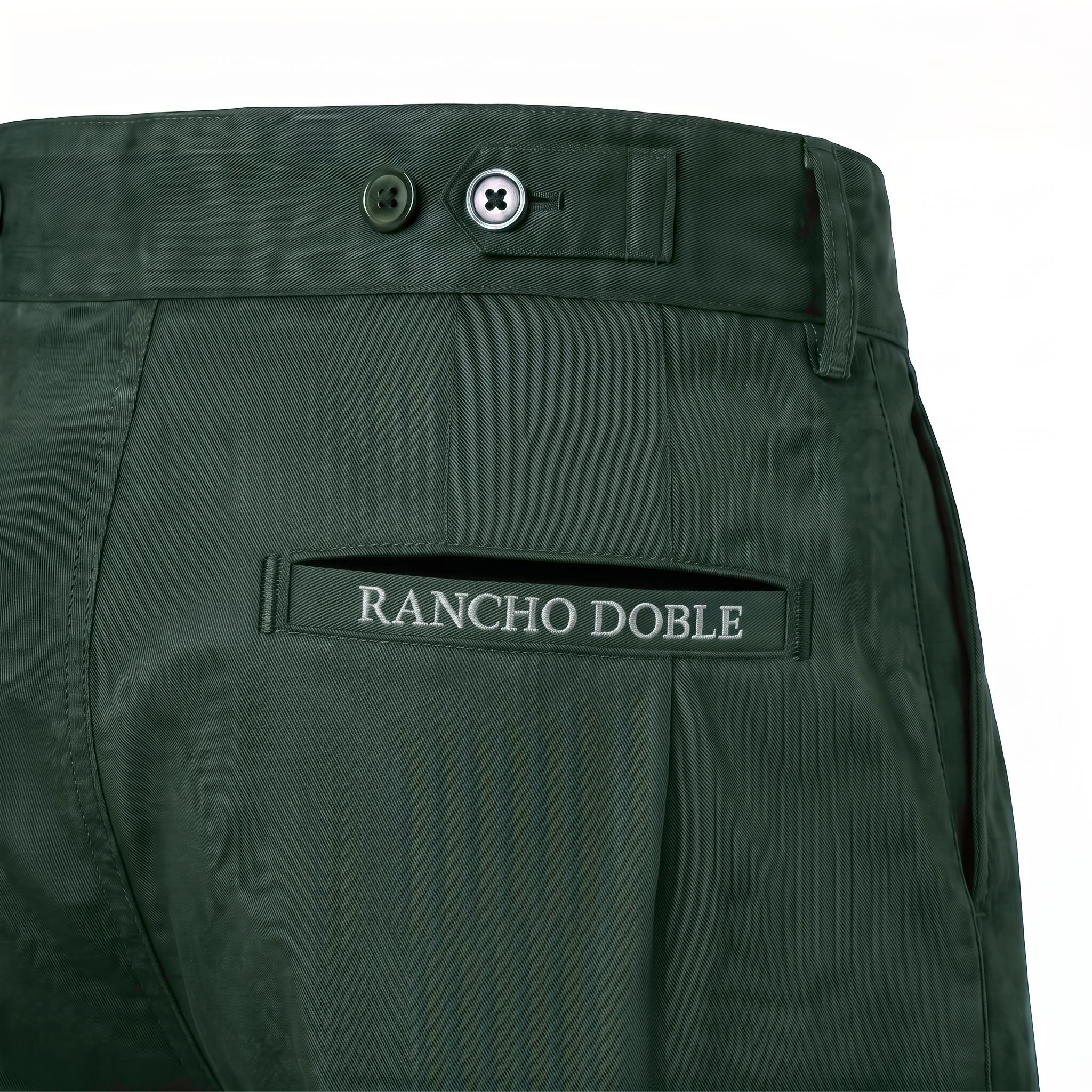 Bombacha de Campo Rancho Doble Verde — detalle bolsillo trasero con etiqueta tejida